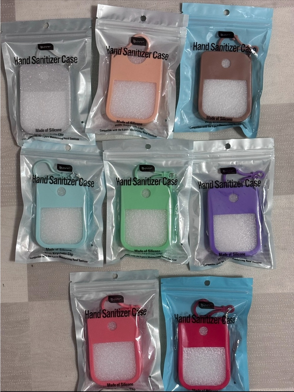 B.Pure Hand Sanitizer Cases Multi-Color Pack